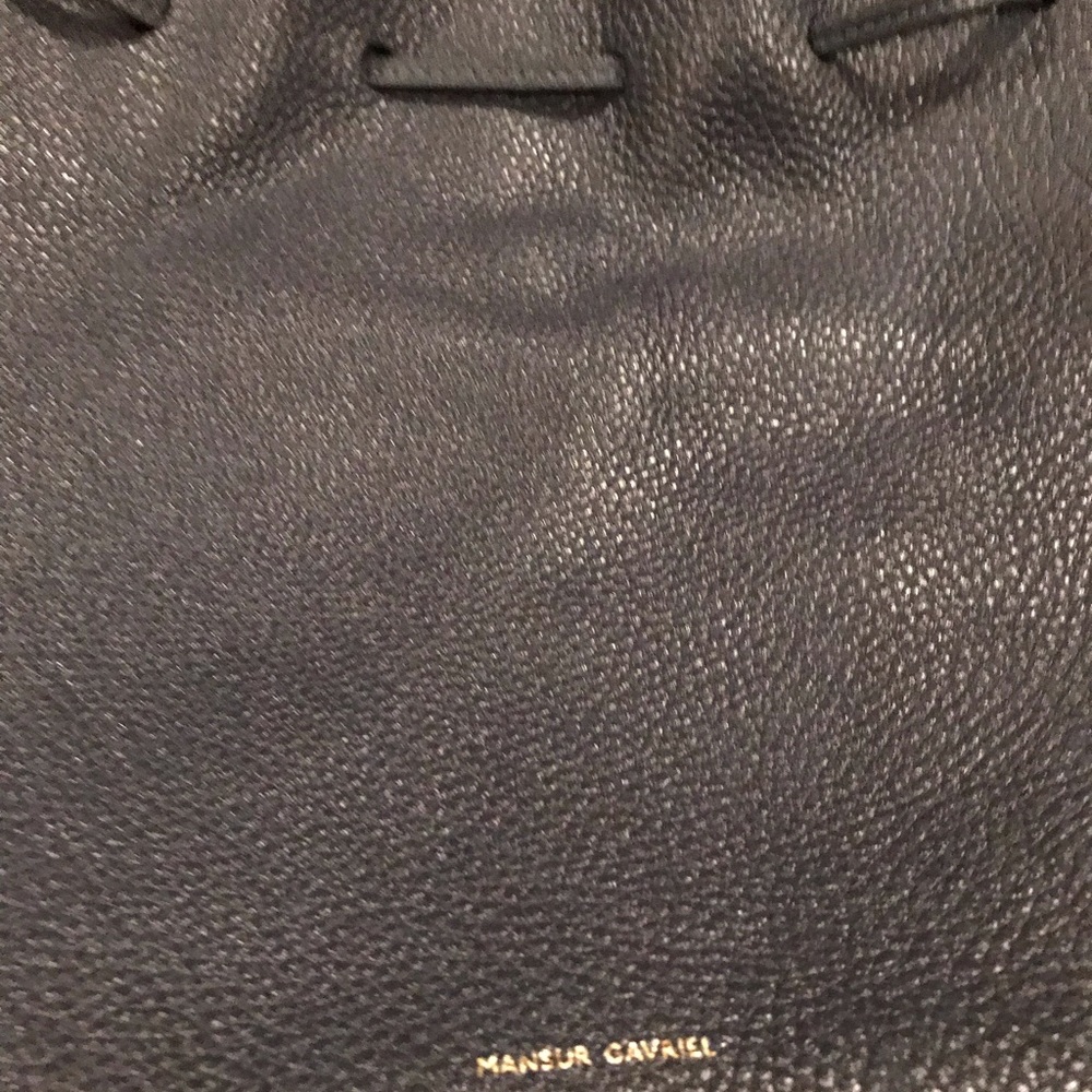 Mansur Gavriel navy pebble bucket bag.